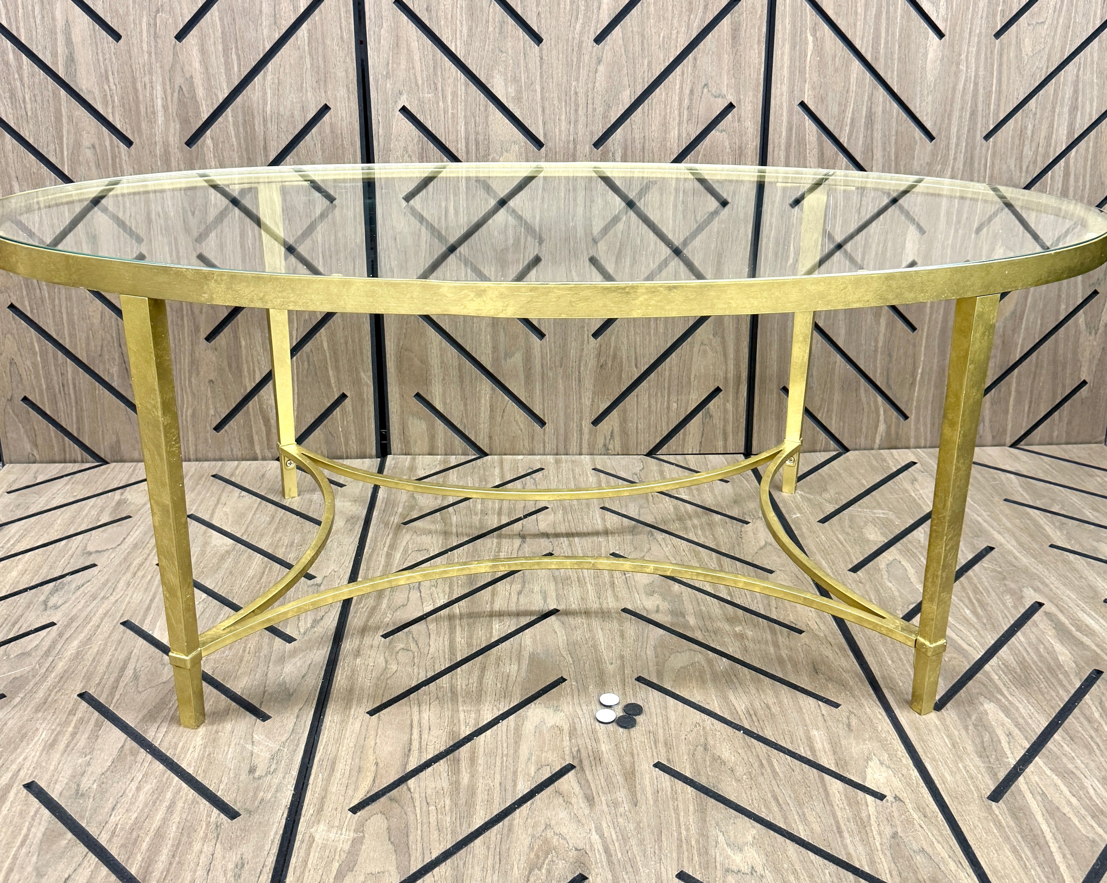 Butler Monica Gold Oval Glass Coffee Table 50 in