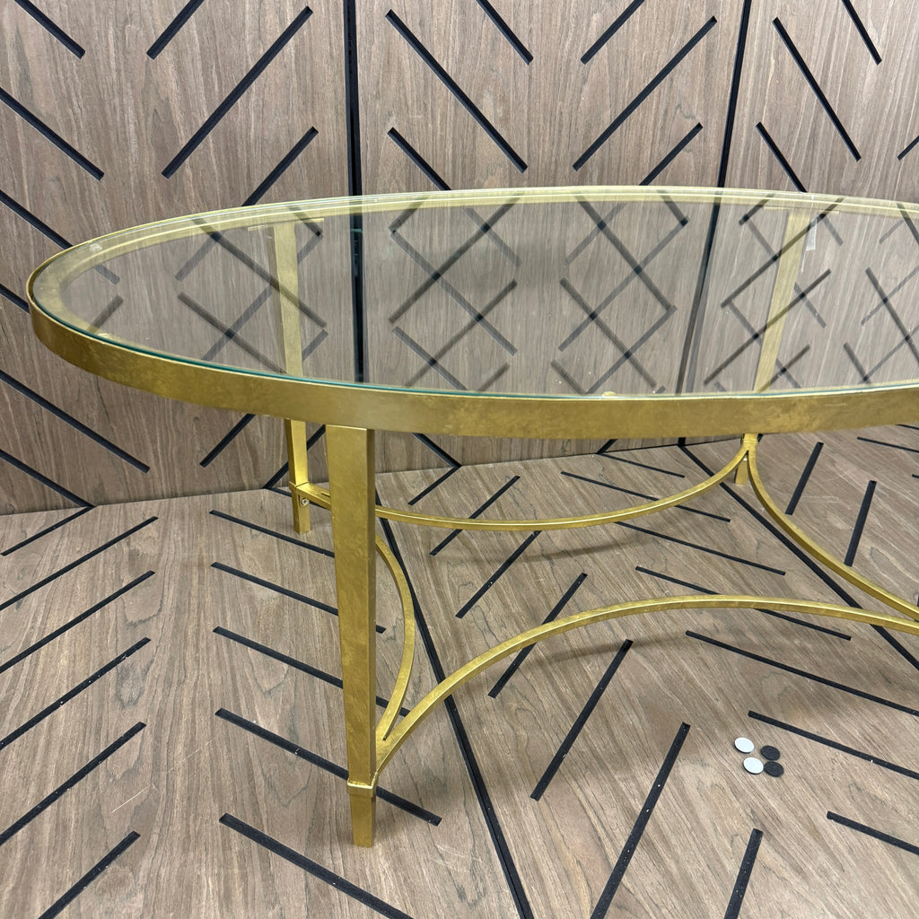 Butler Monica Gold Oval Glass Coffee Table 50 in