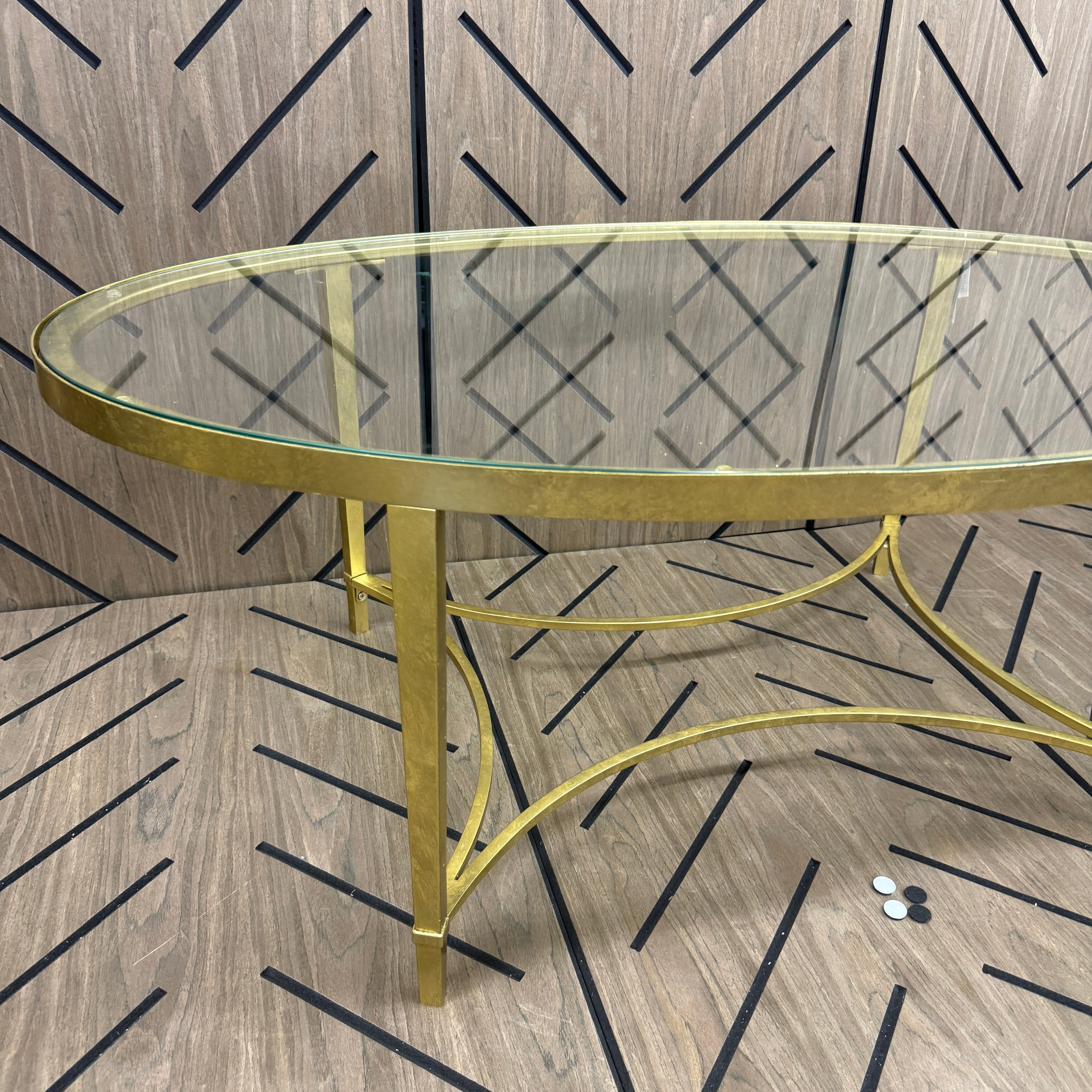 Butler Monica Gold Oval Glass Coffee Table 50 in