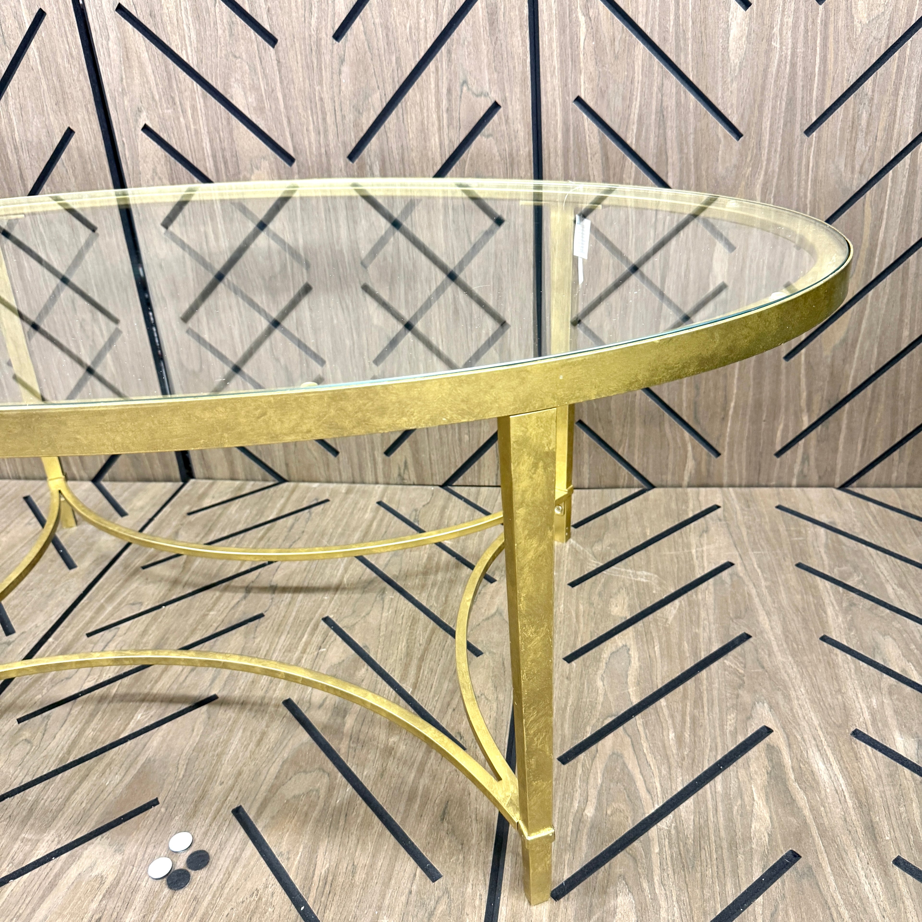 Butler Monica Gold Oval Glass Coffee Table 50 in